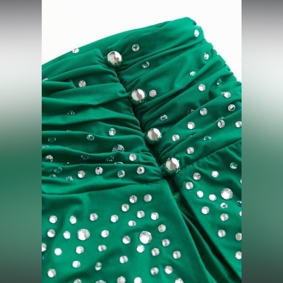 Rabanne  H&M.Figure-hugging top in stretch jersey sparkling glass rhinestones. - Picture 4 of 7